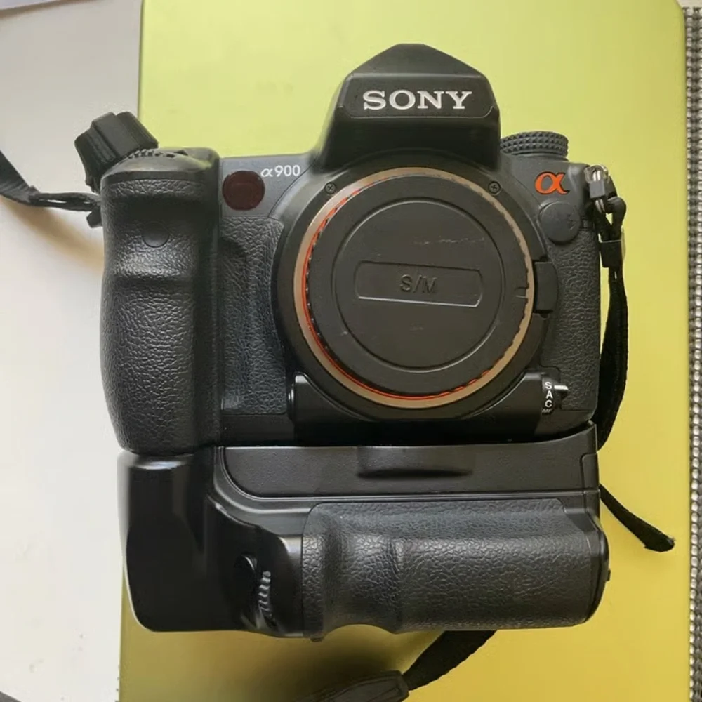 Sony Black Camera Body with Orange Accent